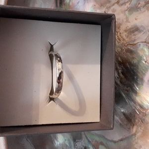 A simple but pretty hammered Sterling silver band.